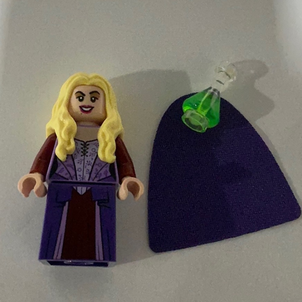 LEGO Minifigure with Purple Outfit and Green Potion